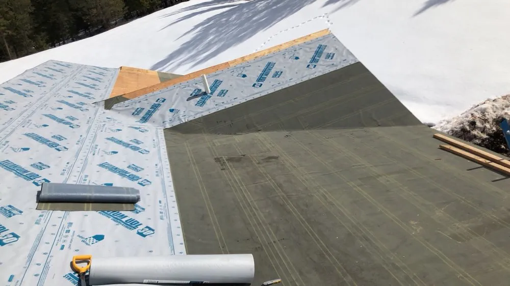 Slide of All-Weather Roofing