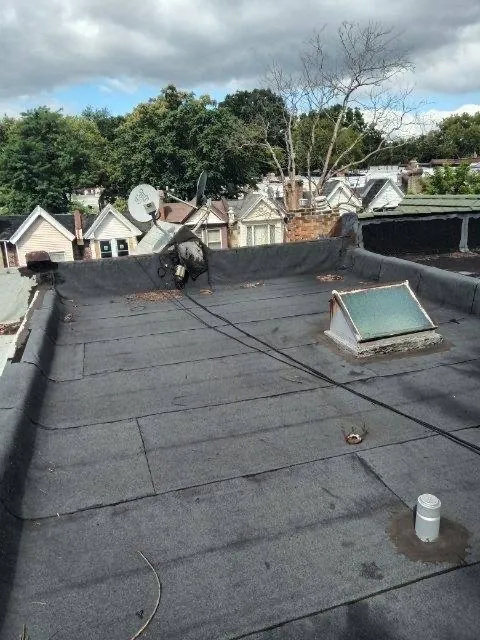 Slide of All Weather Roofing