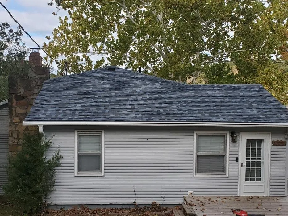 Slide of All Weather Roofing Restoration