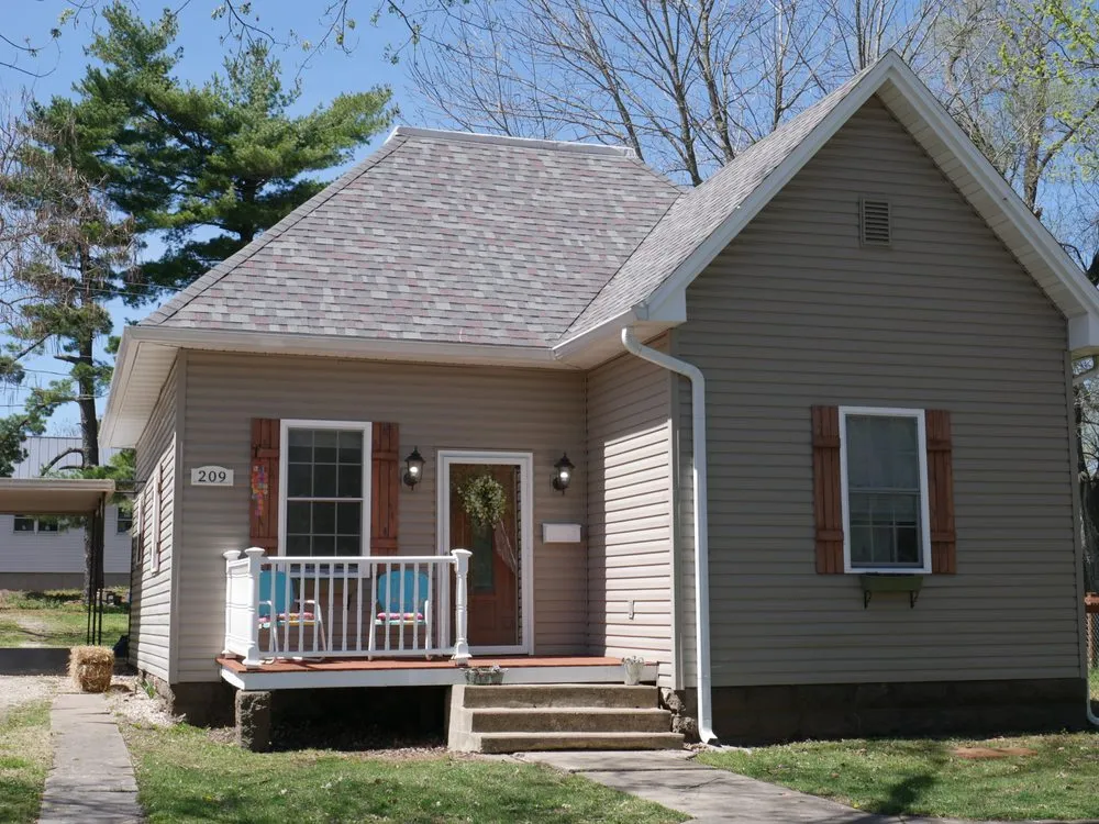 Slide of All Weather Roofing Restoration