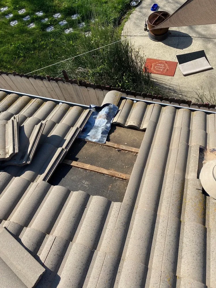 Slide of All Weather Roofing