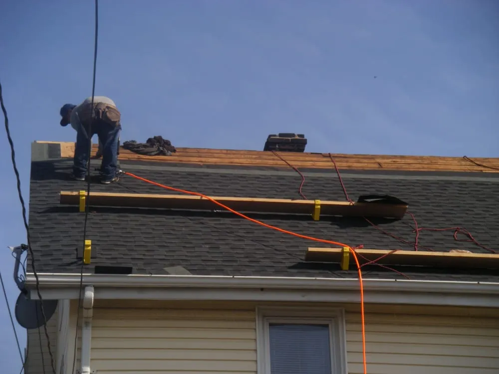Emergency roof installation after storm damage in Flushing, NY by Allen General Contracting