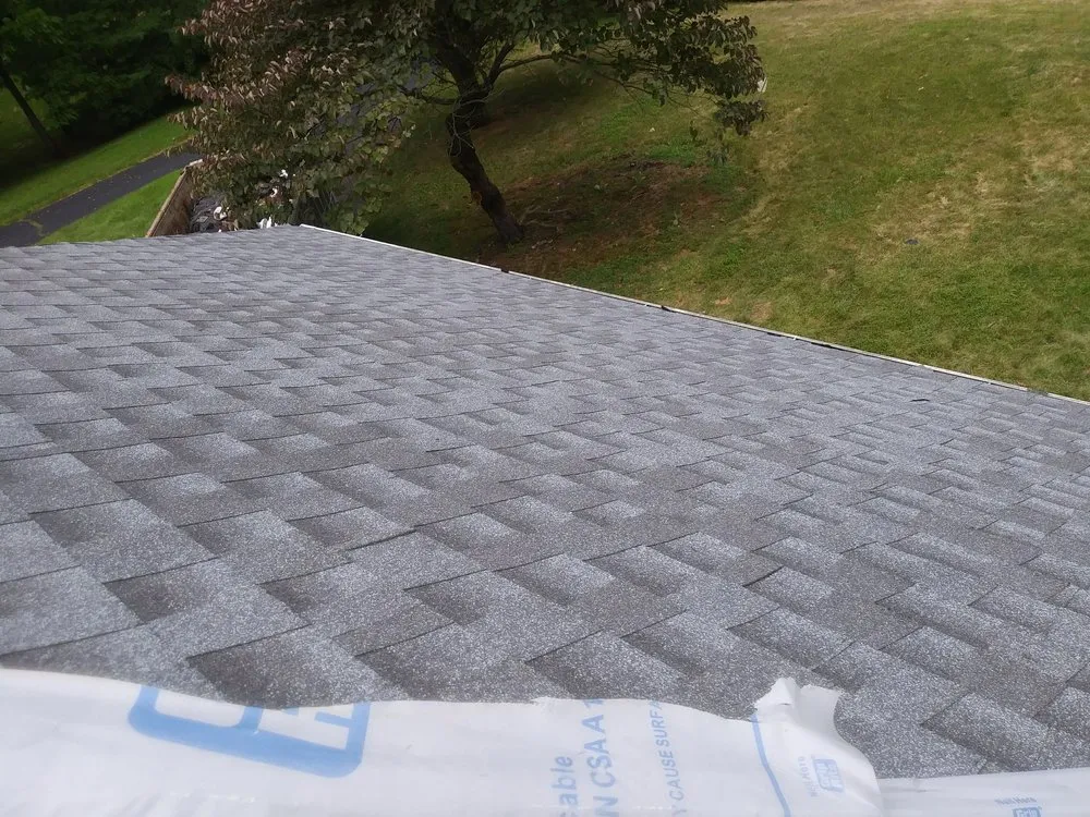 Slide of Allesson Roofing & Siding