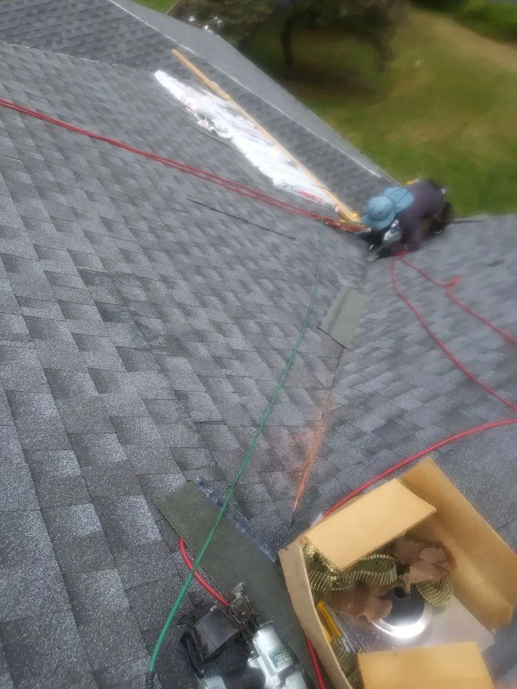 Slide of Allesson Roofing & Siding