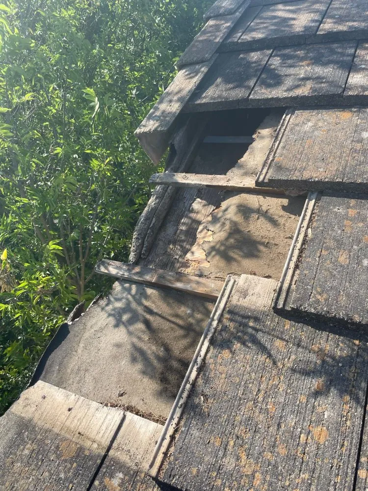 Slide of Allmighty Roofing