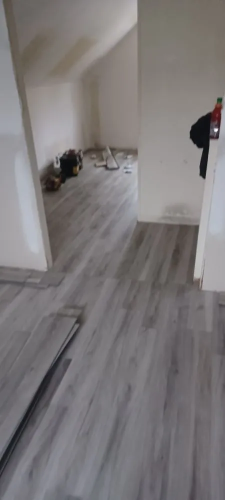 Slide of All's Covered Home Improvement