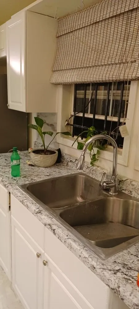 Slide of All's Covered Home Improvement