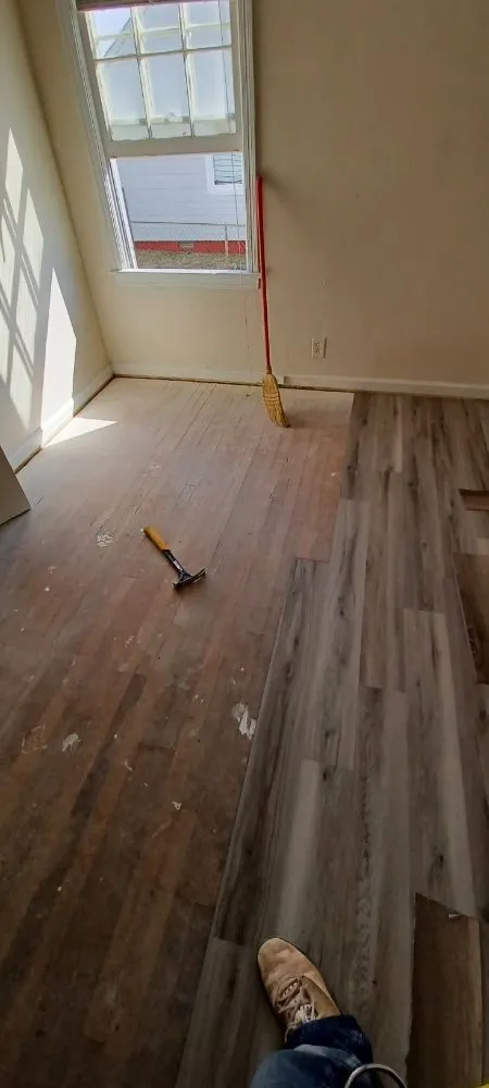 Slide of All's Covered Home Improvement