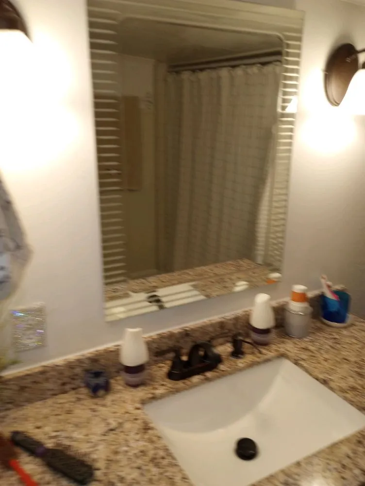 Slide of All's Covered Home Improvement