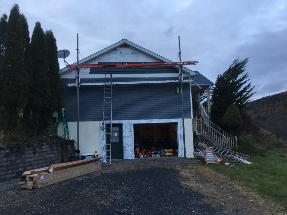 Slide of Ally Roofing