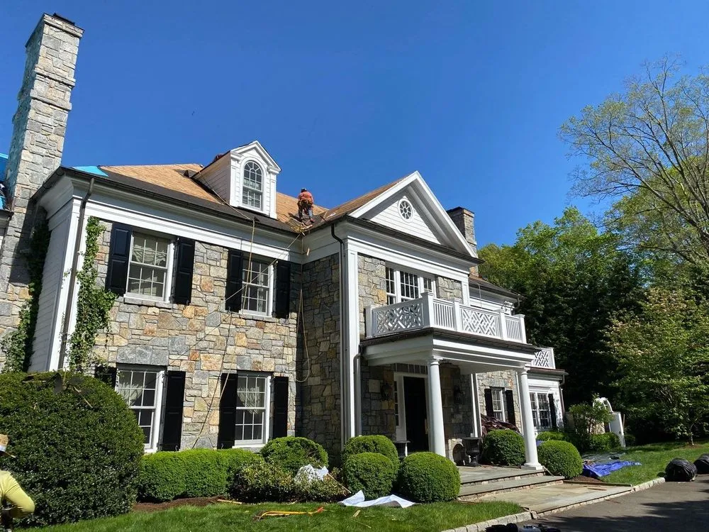 Slide of Ally Roofing