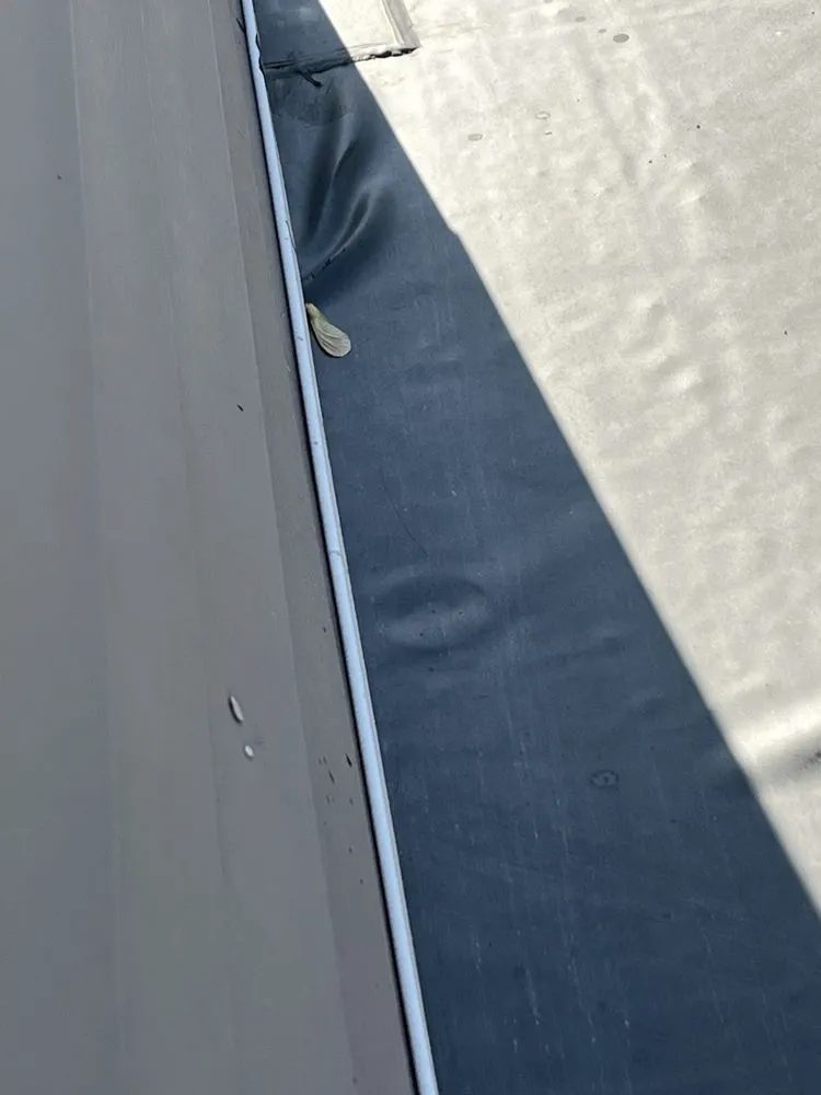 Slide of Ally Roofing