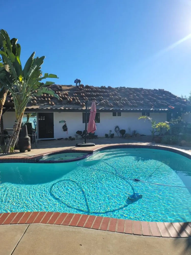 Slide of Alma Roofing