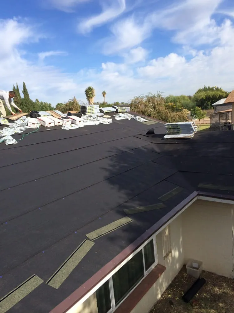 Slide of Almada Roofing