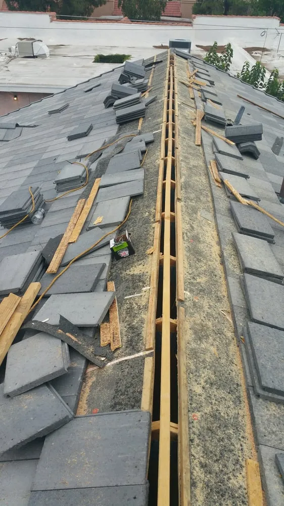 Slide of Almada Roofing