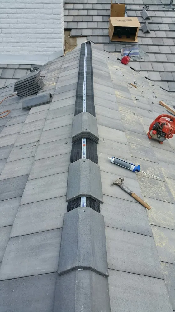 Slide of Almada Roofing