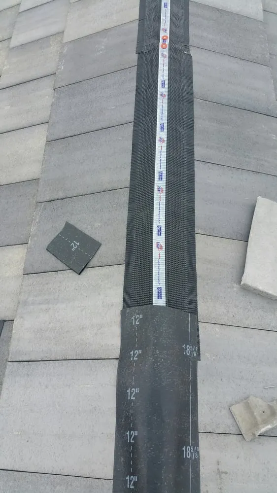 Slide of Almada Roofing