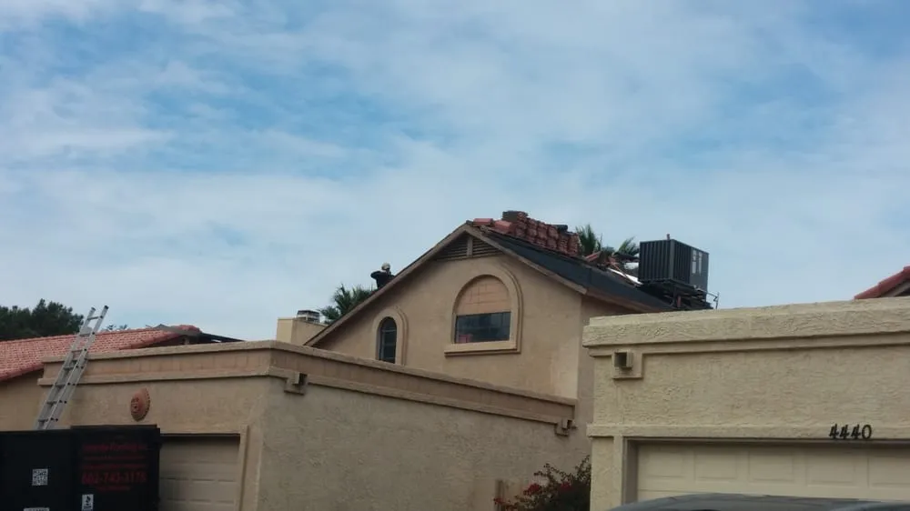 Slide of Almeida Roofing