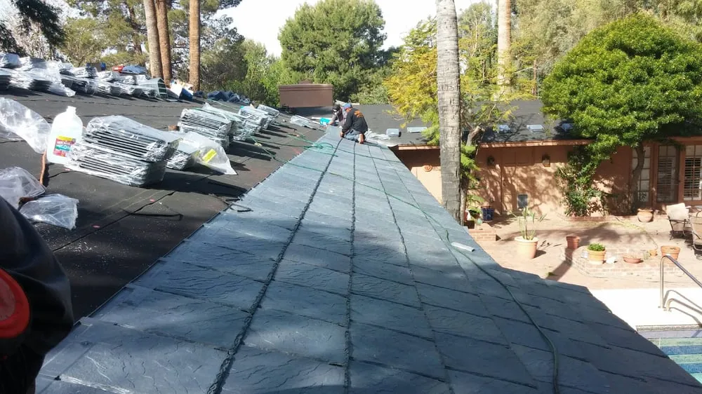 Slide of Almeida Roofing