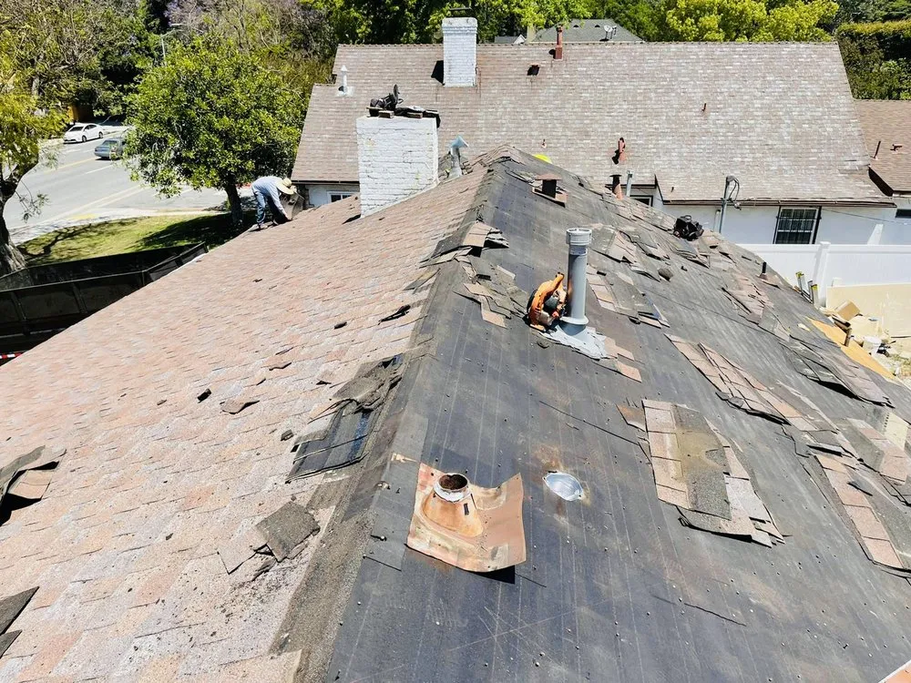 Slide of Almighty Roofing