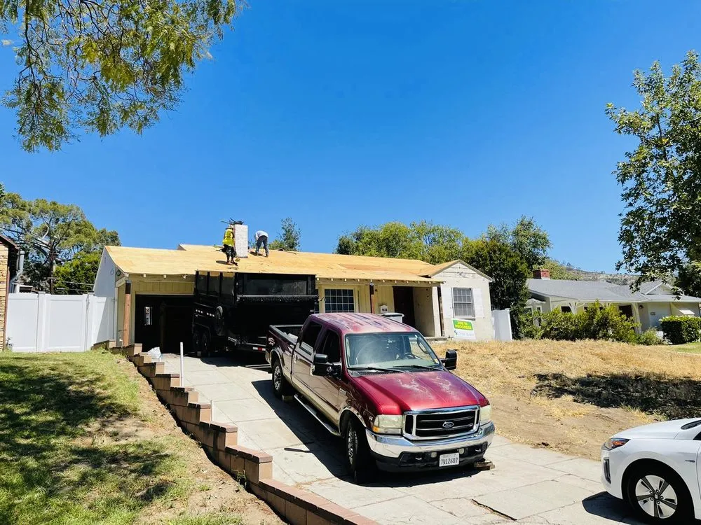 Slide of Almighty Roofing