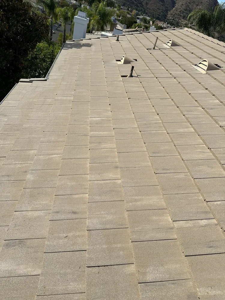 Slide of Aloha Bros Roof Cleaning