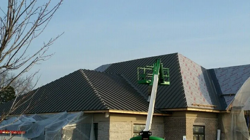 Slide of Alois Roofing