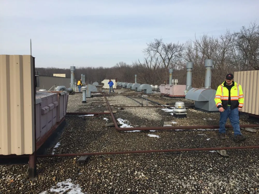 Slide of Alois Roofing