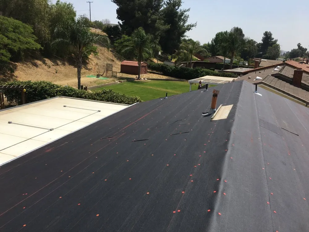 Slide of Alpha Roofing Company