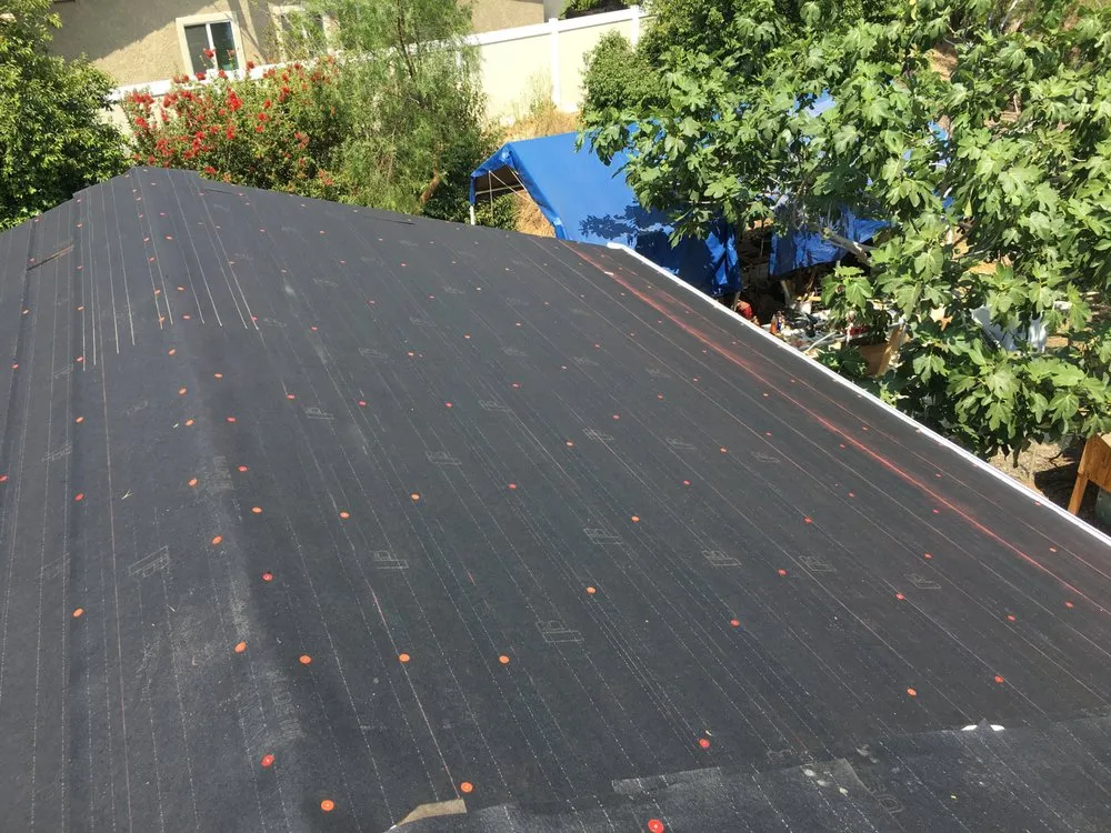 Slide of Alpha Roofing Company