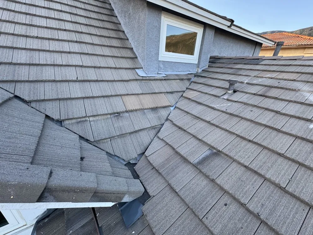 Slide of Alpha Roofing Company