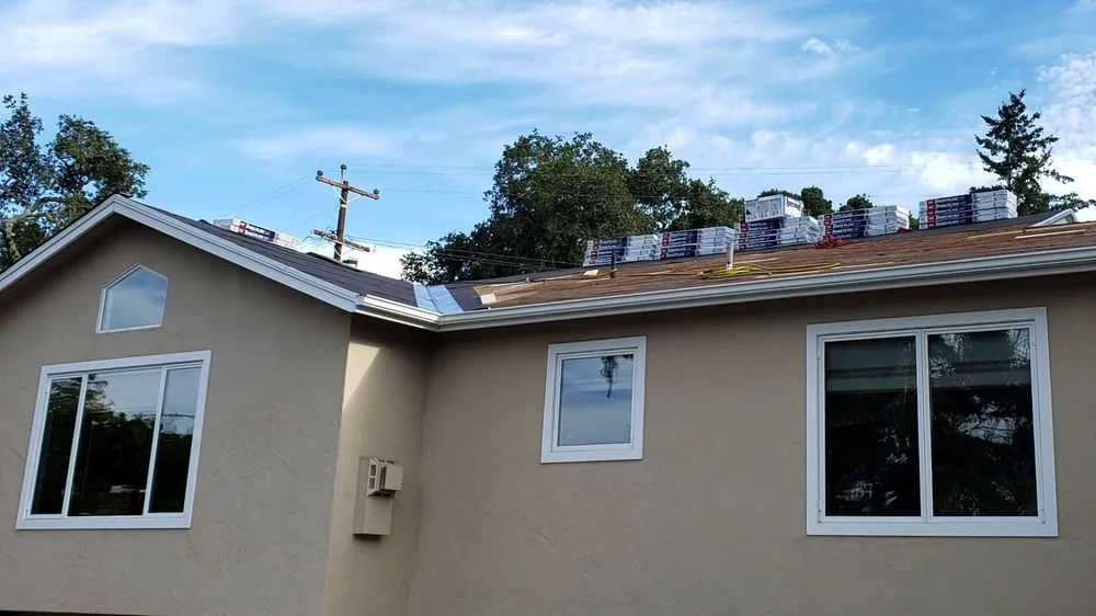 Slide of Alpha Roofing Company