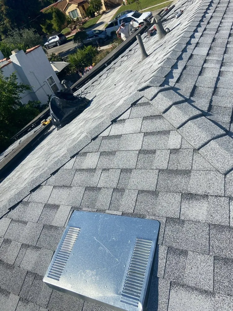 Slide of Alpha Roofing Group