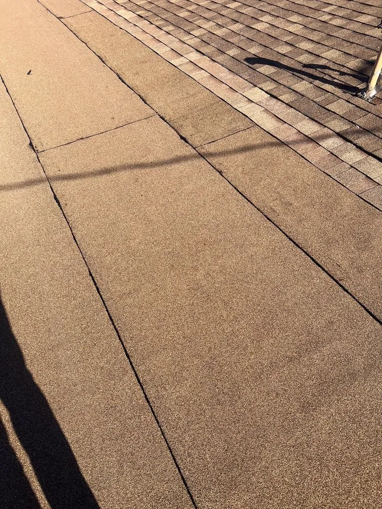 Slide of Alpha Roofing Group