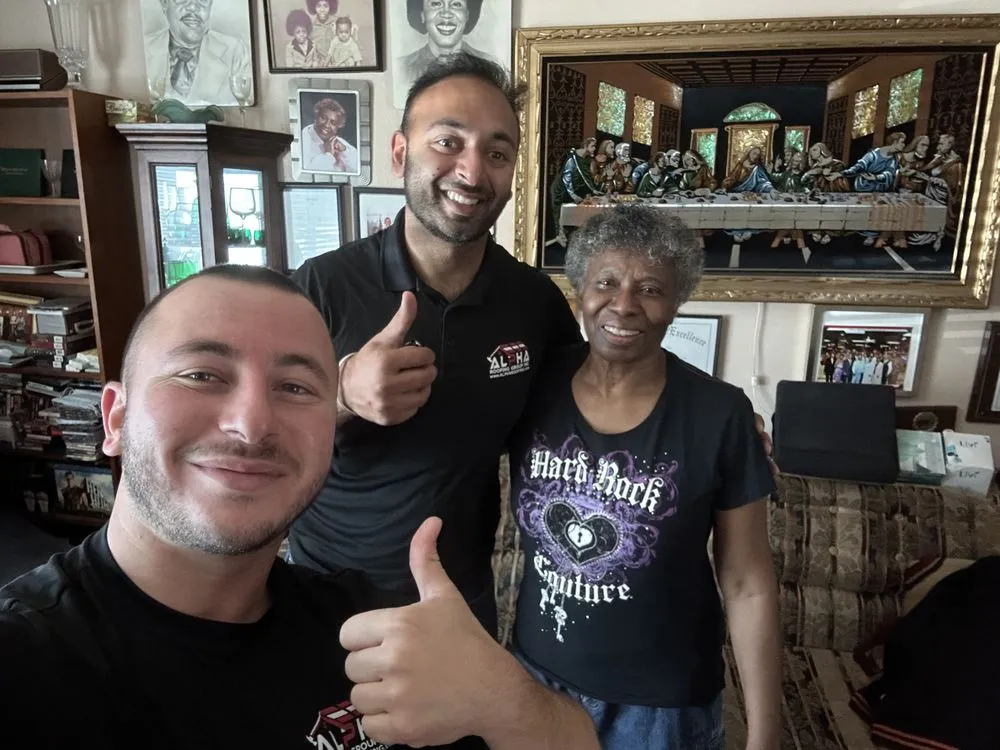 Slide of Alpha Roofing Group