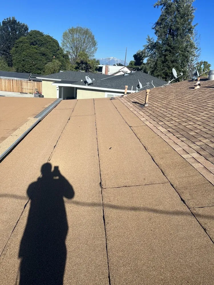 Slide of Alpha Roofing Group