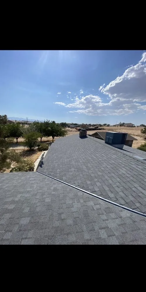 Slide of Alpha Roofing Group