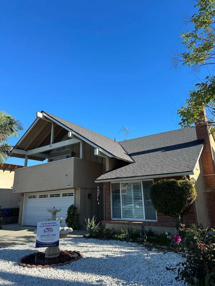 Slide of Alpha Roofing Group