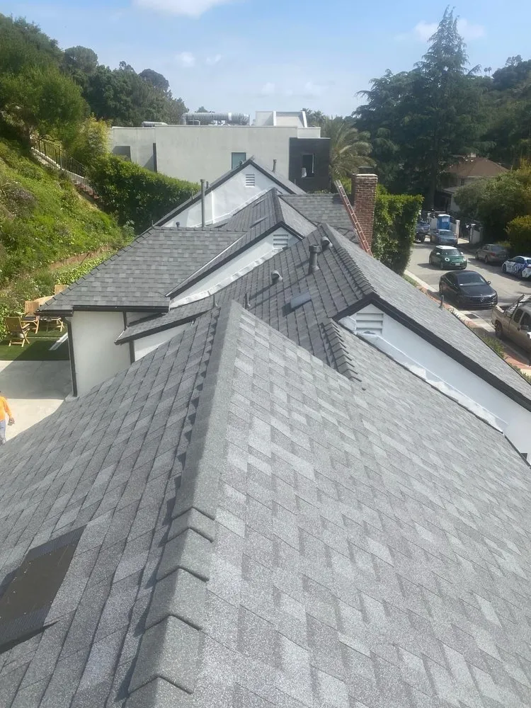 Slide of Alpha Roofing Group