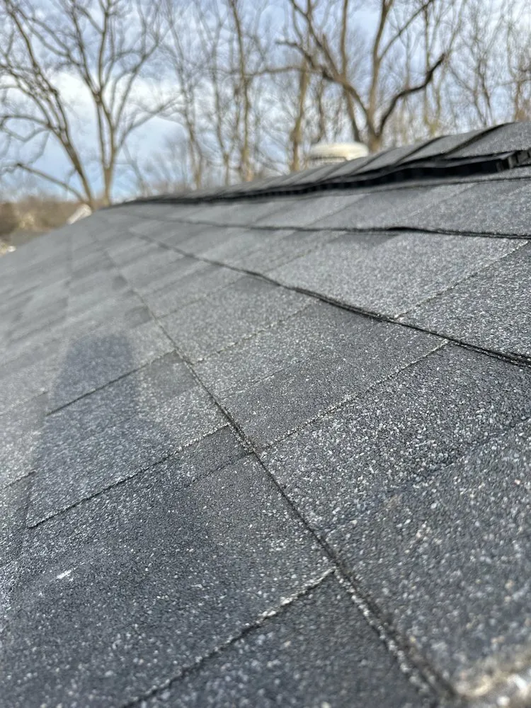 Slide of Alpha Roofing