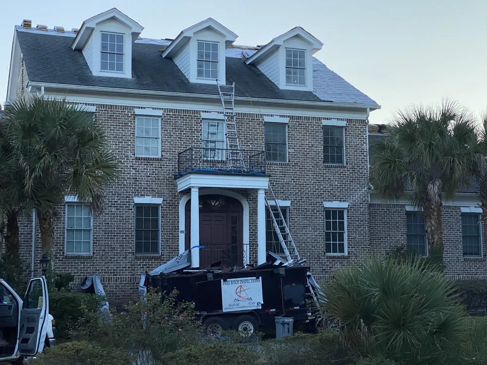 Slide of Alpha Roofing Services