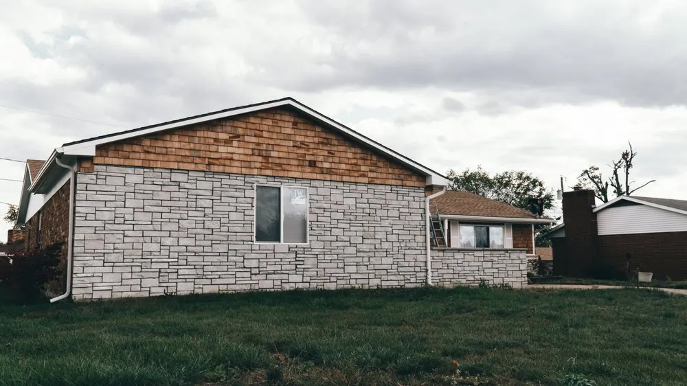 Slide of AlphaOne Exteriors