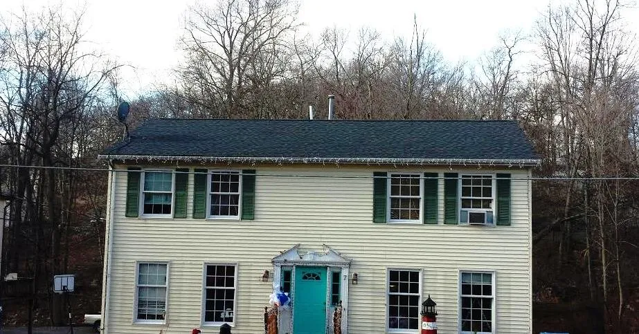 Slide of Alpine Roofing