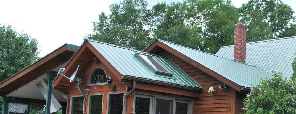 Licensed roof leak repair after storm damage in Sidney Center, NY by Alpine Roofing