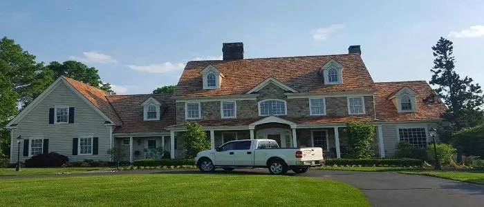 Slide of Al's Group Roofing