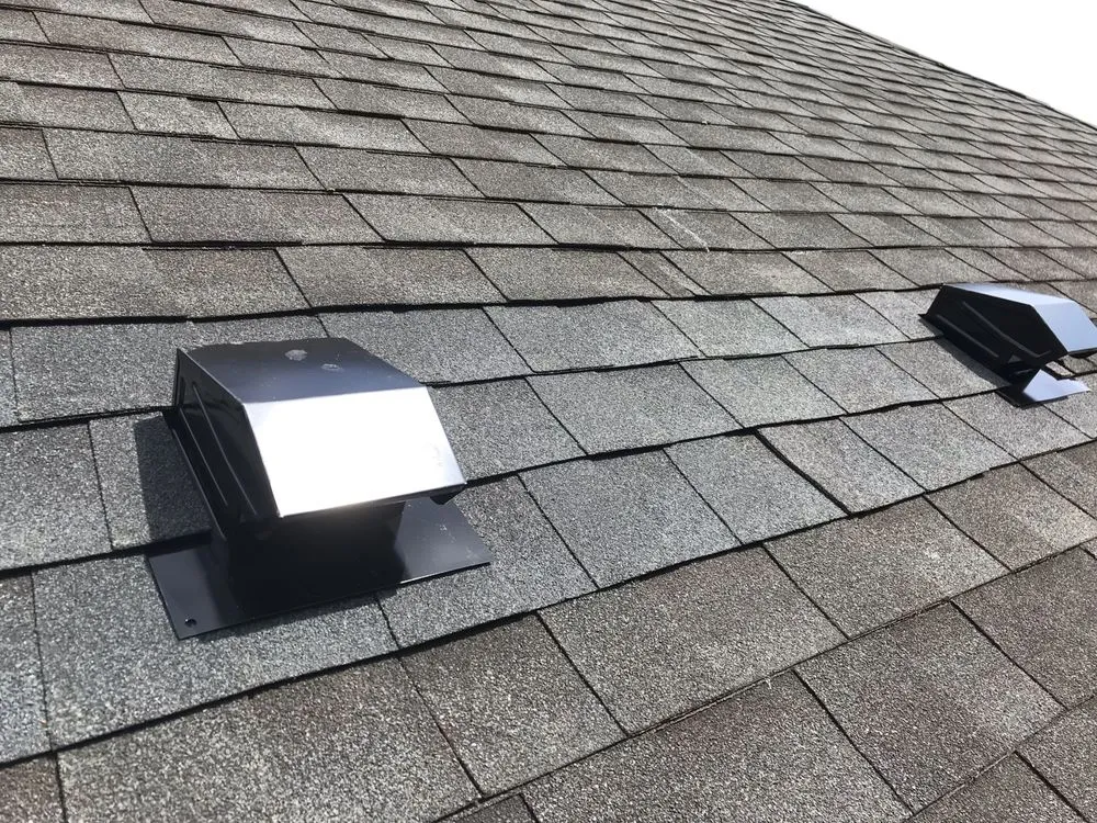 Slide of Al's Group Roofing