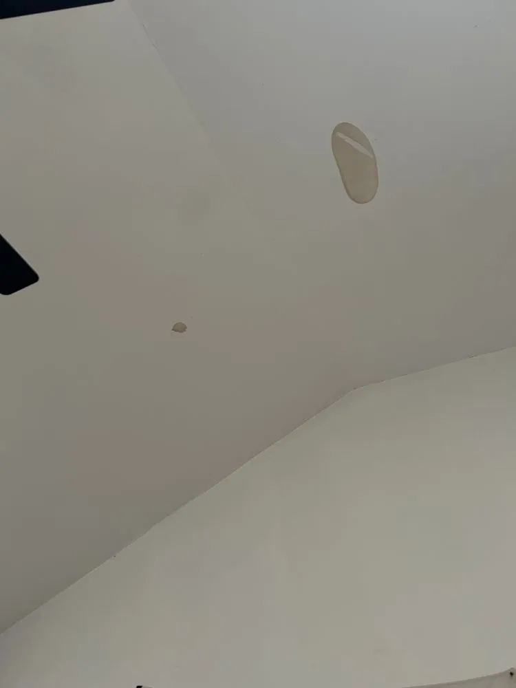 Slide of Al's Group Roofing