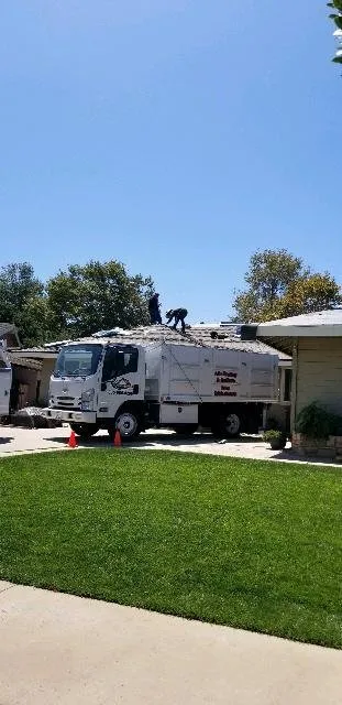 Slide of Al's Roofing & Gutters