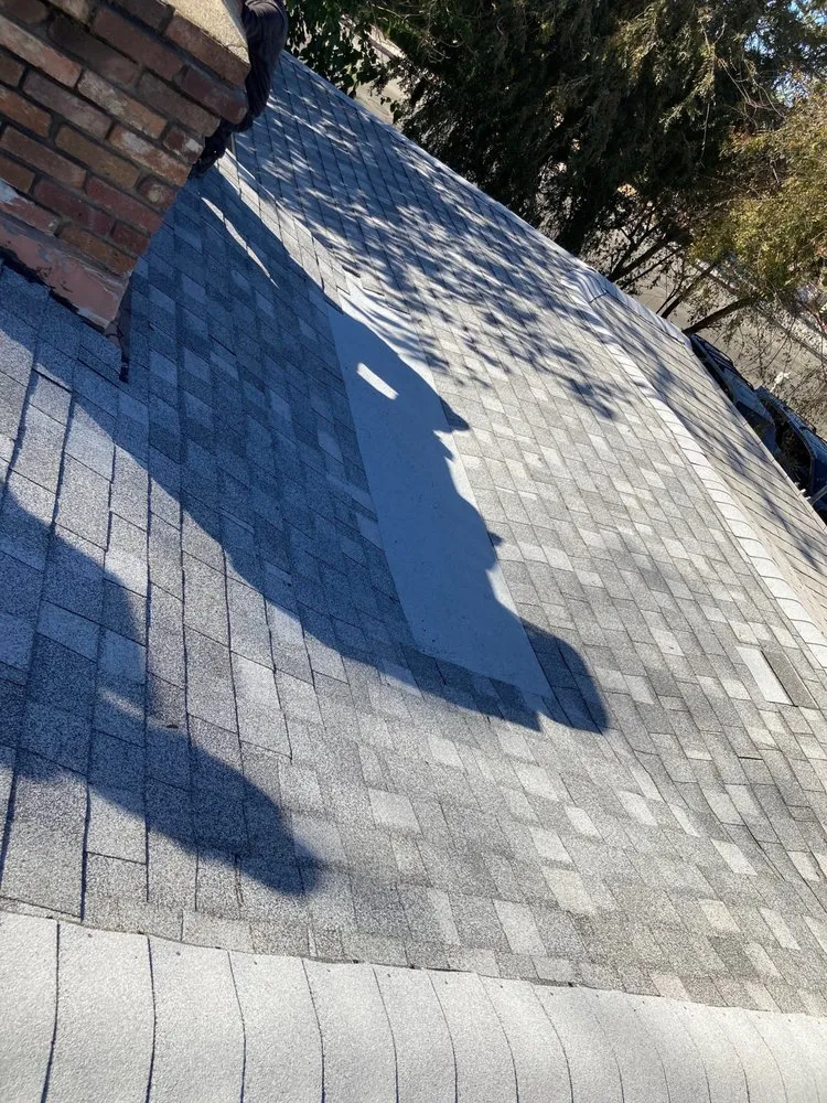 Slide of Al's roofing repairs