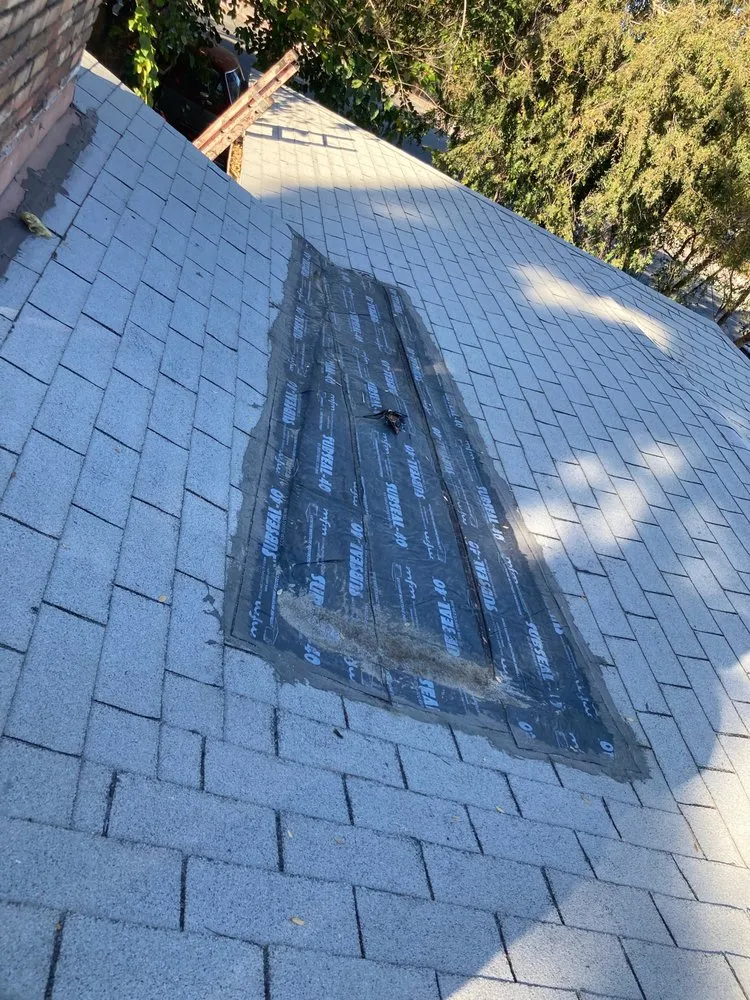 Slide of Al's roofing repairs